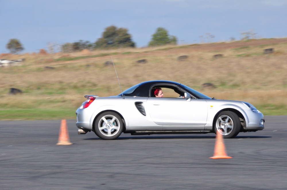 Laura demonstrating motorkhana racing at WIM event